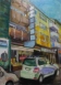 "Straßenszene mit Wollmarkt” Mischtechnik auf Hartfaser, 61 x 45 cm, 2015